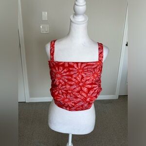 NWOT Free People All Tied Up Cropped Tank Size Medium Color is Red.